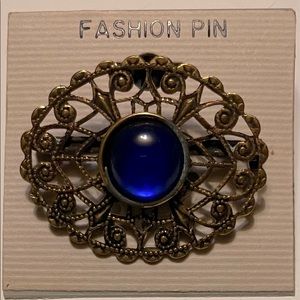 Vintage gold plated with blue stone